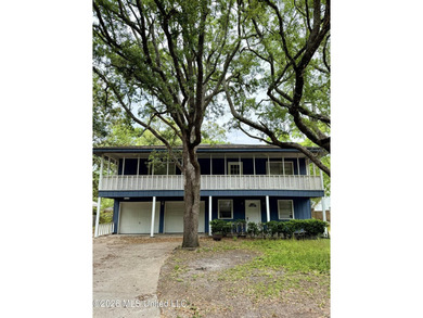 AS-IS Investment Opportunity in Ocean Springs! Unlock the - photo 1