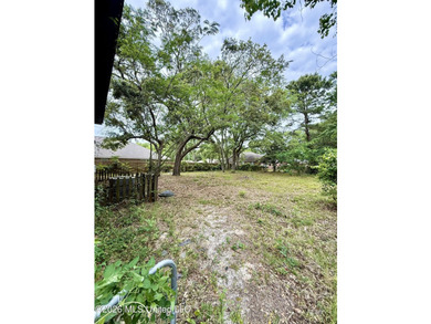 AS-IS Investment Opportunity in Ocean Springs! Unlock the - photo 2