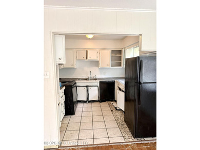 AS-IS Investment Opportunity in Ocean Springs! Unlock the - photo 5