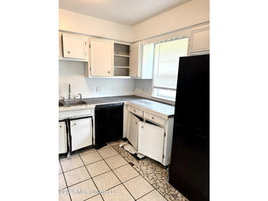 AS-IS Investment Opportunity in Ocean Springs! Unlock the - photo 7