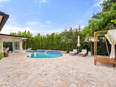 LUXURY updated 4 bedroom/3 bathroom SMART home in Coral Ridge - photo 4
