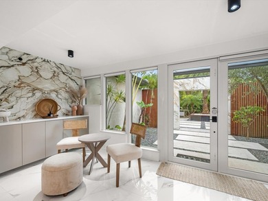 LUXURY updated 4 bedroom/3 bathroom SMART home in Coral Ridge - photo 7