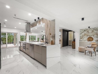 LUXURY updated 4 bedroom/3 bathroom SMART home in Coral Ridge - photo 8