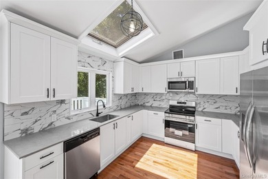 PRICE IMPROVED! Welcome to this exceptional 4-bedroom, 3-bath - photo 15