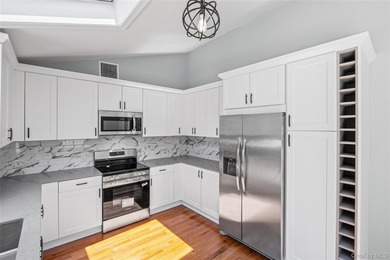 PRICE IMPROVED! Welcome to this exceptional 4-bedroom, 3-bath - photo 16
