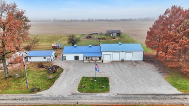 This exceptional 2-year-old barndominium offers modern country