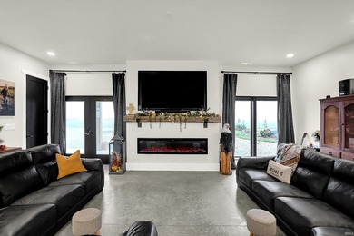 This exceptional 2-year-old barndominium offers modern country