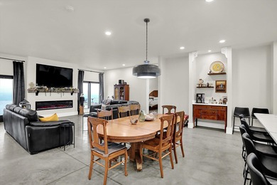 This exceptional 2-year-old barndominium offers modern country