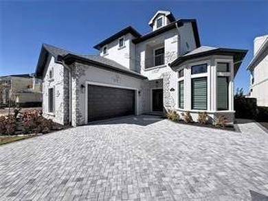 Located at 7394 Gathering Court within the exclusive gates of - photo 1