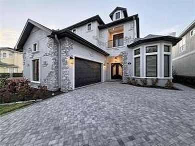 Located at 7394 Gathering Court within the exclusive gates of - photo 2