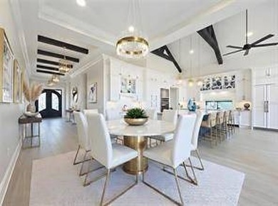 Located at 7394 Gathering Court within the exclusive gates of - photo 4