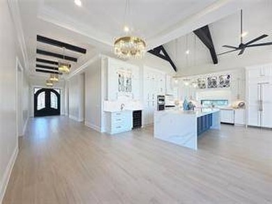 Located at 7394 Gathering Court within the exclusive gates of - photo 9