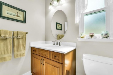 Tucked at the end of a quiet cul-de-sac on a private corner lot