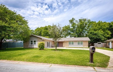 Located in Ocean Springs' desirable Golf Cart District, this - photo 2