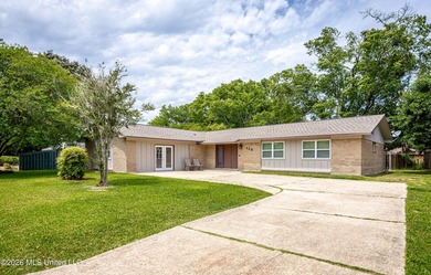 Located in Ocean Springs' desirable Golf Cart District, this - photo 3
