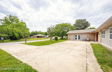 Located in Ocean Springs' desirable Golf Cart District, this - photo 5