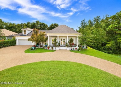Custom Acadian Masterpiece on Private Corner Lot in Coveted - photo 1
