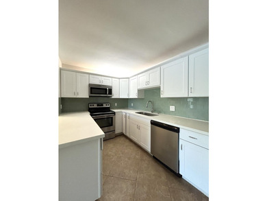 Great Condo! This 2-Bedroom, 2-Bathroom on the 1st floor offers - photo 2