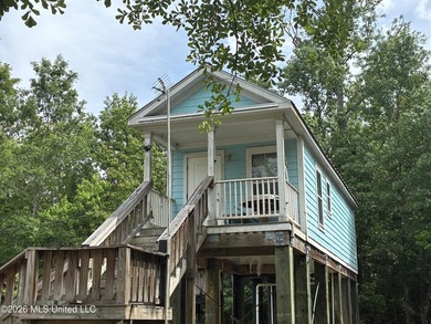 Charming cottage nestled on a spacious half-acre lot in the - photo 2