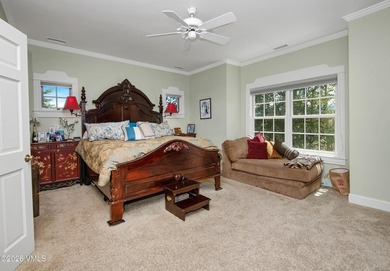 Positioned on arguably the finest lot in Eagle Ranch, this - photo 18