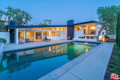 Welcome to 1071 Tellem Drive, a captivating blend of timeless - photo 1