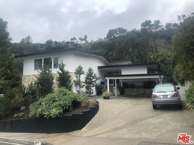 Welcome to 1071 Tellem Drive, a captivating blend of timeless - photo 3