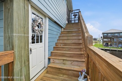 Waterfront living meets coastal charm in this beautifully - photo 27