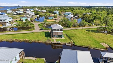Waterfront living meets coastal charm in this beautifully - photo 44