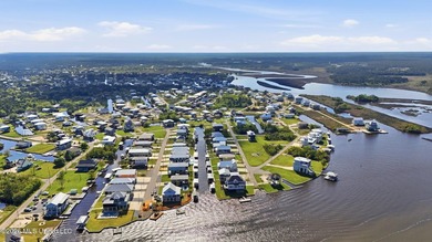 Waterfront living meets coastal charm in this beautifully - photo 47