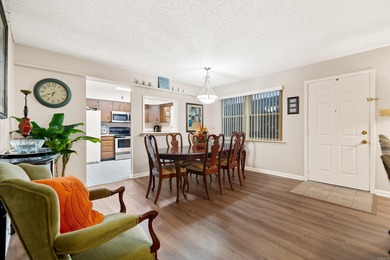 This spacious ground level condo has NO STAIRS.  New flooring in