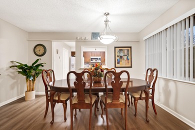 This spacious ground level condo has NO STAIRS.  New flooring in