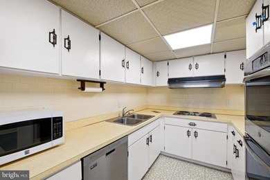 Welcome to Coffee Run. This 5th floor unit boasts higher