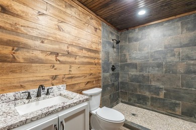 Welcome to 440 Lakeside Drive, a premier lakefront property on - photo 13