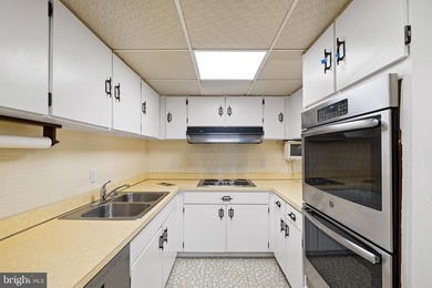 Welcome to Coffee Run. This 5th floor unit boasts higher