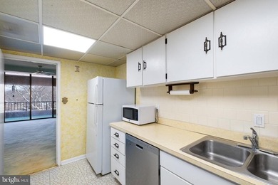 Welcome to Coffee Run. This 5th floor unit boasts higher