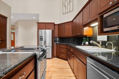 Custom single-level home overlooking the 8th fairway in the - photo 15