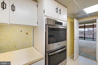 Welcome to Coffee Run. This 5th floor unit boasts higher