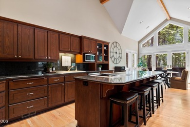 Custom single-level home overlooking the 8th fairway in the - photo 16