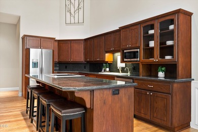 Custom single-level home overlooking the 8th fairway in the - photo 17