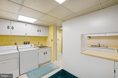 Welcome to Coffee Run. This 5th floor unit boasts higher