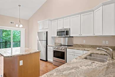 Enjoy carefree condo living in this spacious upper-level - photo 9