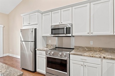 Enjoy carefree condo living in this spacious upper-level - photo 10