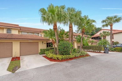 Lake Townhome/Townhouse For Sale in Wellington, Florida