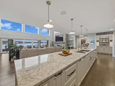 A Masterpiece of Modern Waterfront Luxury. Discover a rare - photo 10