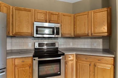 Enjoy peaceful living & abundant natural light in this - photo 12