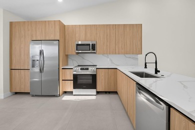 Welcome to this beautifully and completely remodeled - photo 7