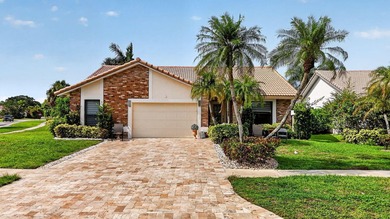 Welcome to this single-story residence in Boca Greens 5, Boca - photo 1
