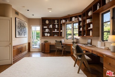 Set behind private gates with a circular driveway, this - photo 12