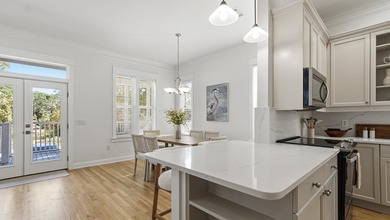 Savor the sublime seaside lifestyle in this beautifully upgraded - photo 12