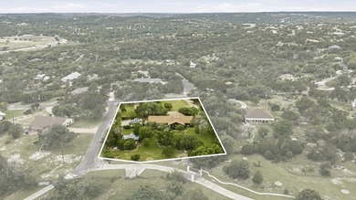 This Mediterranean-style Hill Country residence sits on more - photo 27